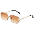 Rimless square sunglasses with a gold metal frame, brown gradient lenses, and black temple tips on a white background.